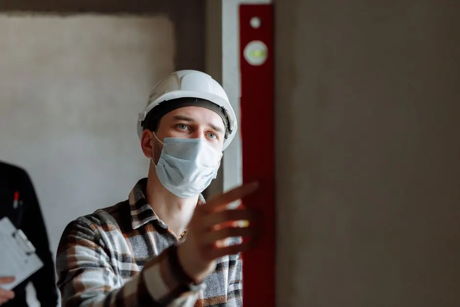 Pest control technician on site.
